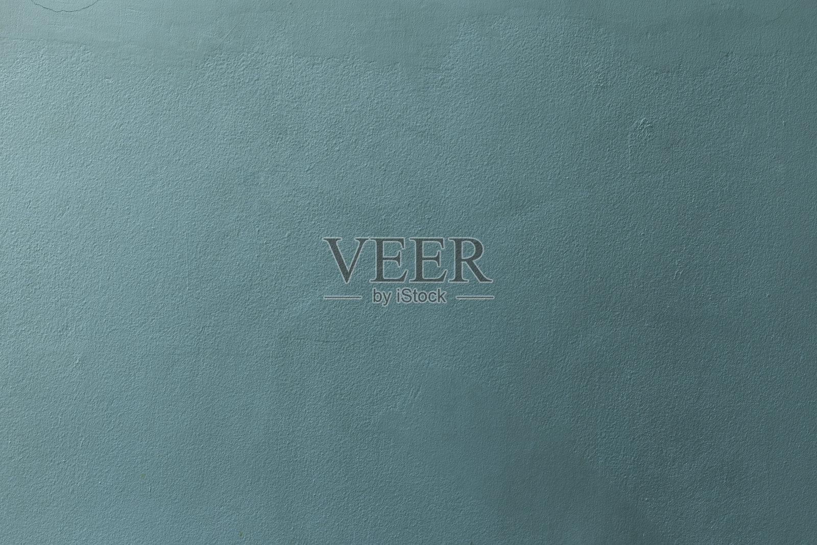 大部分不饱和的暗青色与旧的垃圾墙混凝土纹理作为背景。照片摄影图片