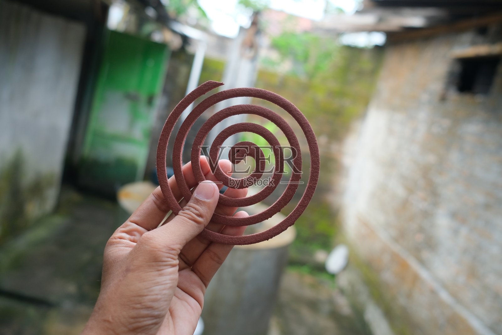 红蚊子的手照片摄影图片