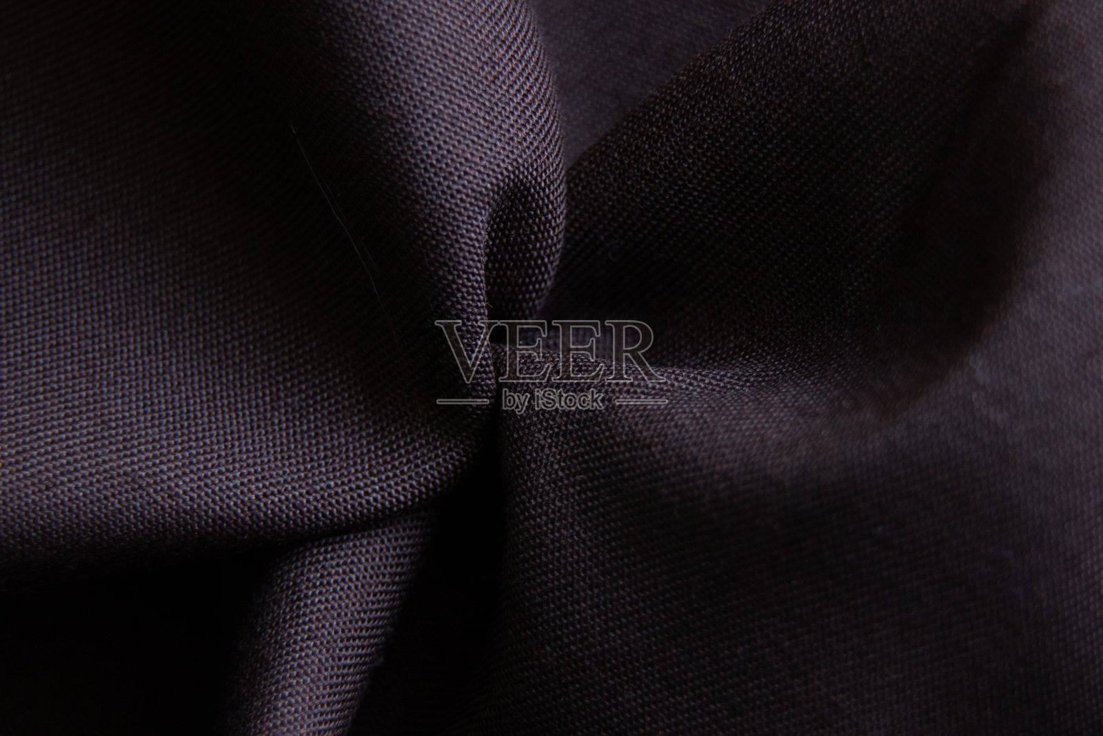 作为背景特写的深棕色褶皱织物照片摄影图片