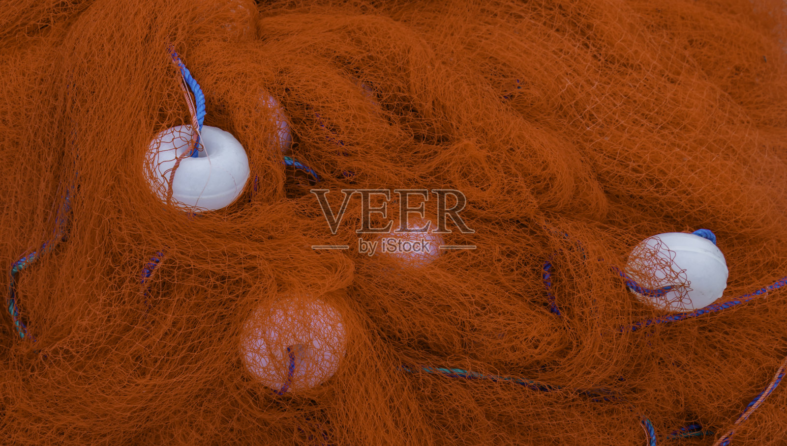 一张红色渔网的特写图片。渔业。照片摄影图片