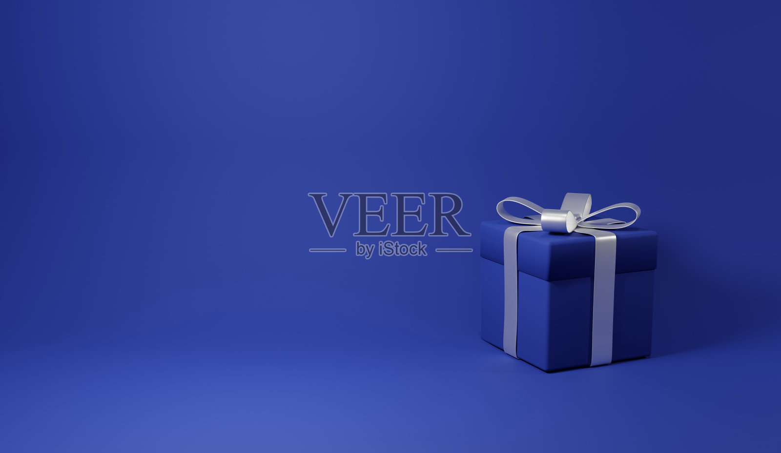 3 d渲染。蓝色背景上的蓝色盒子。银色的丝带。照片摄影图片