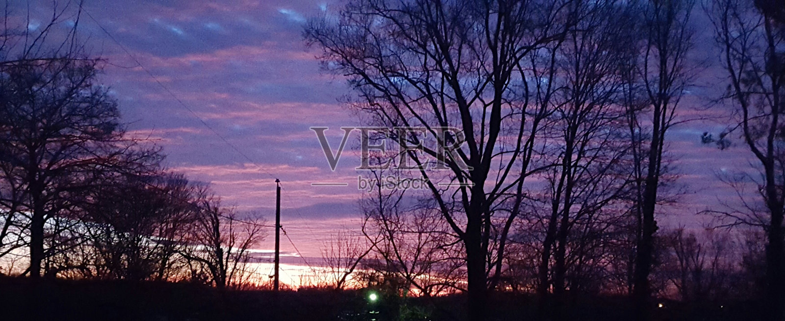 紫色的日出照片摄影图片