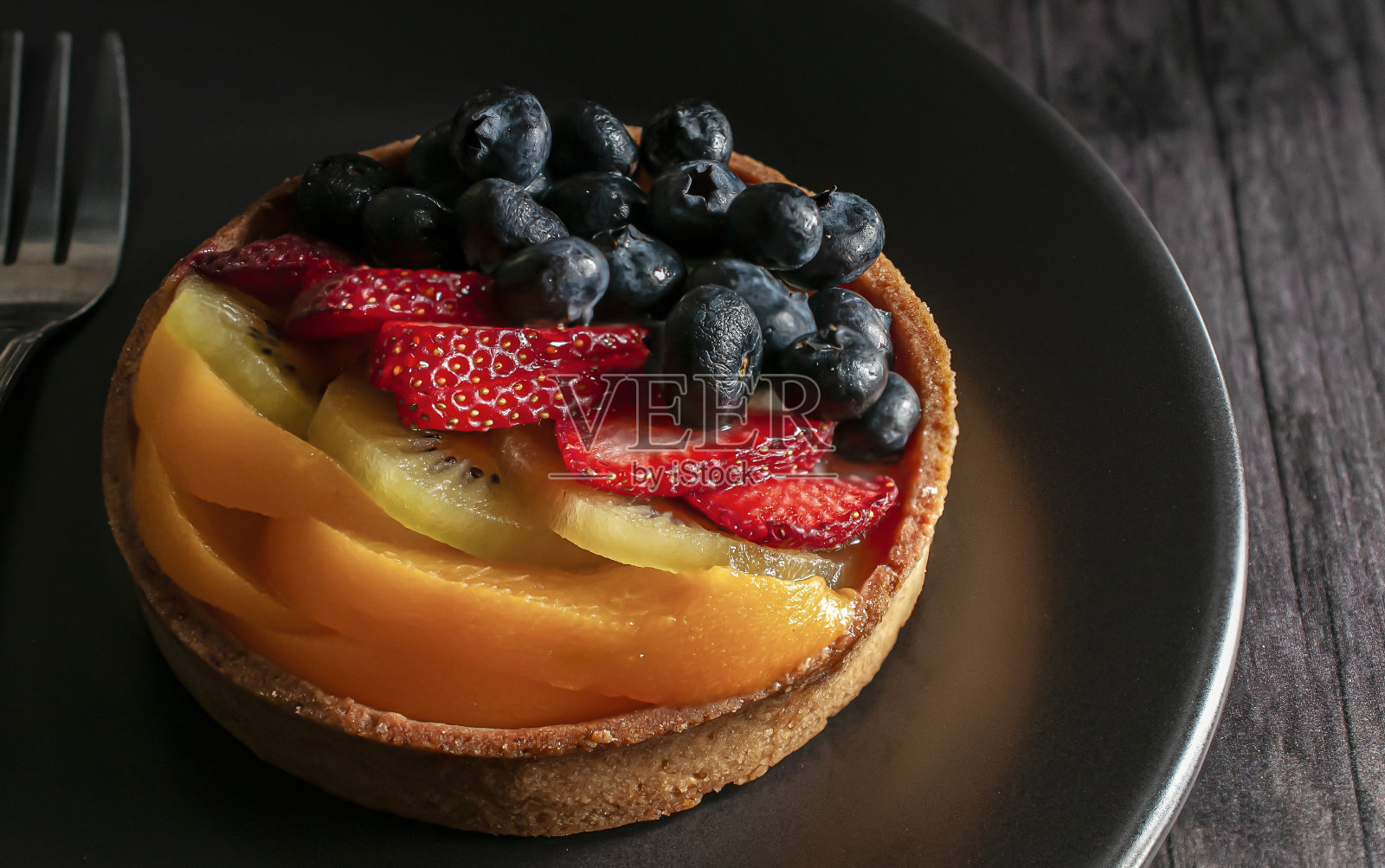 美食摄影,水果挞。照片摄影图片