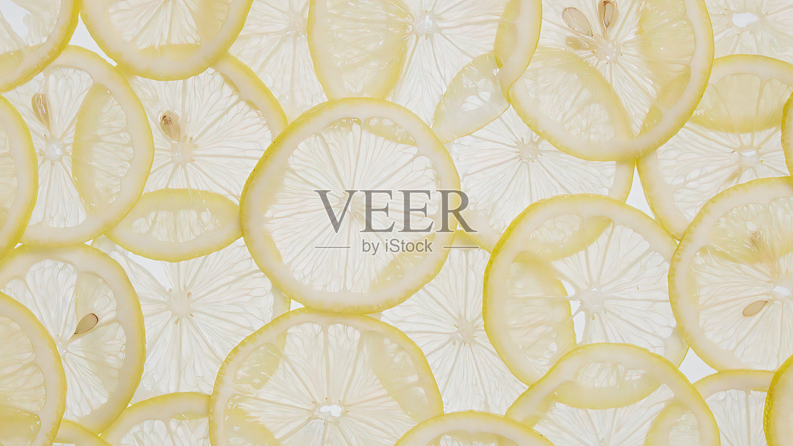 薄薄的柠檬片一层层地堆叠在一起照片摄影图片