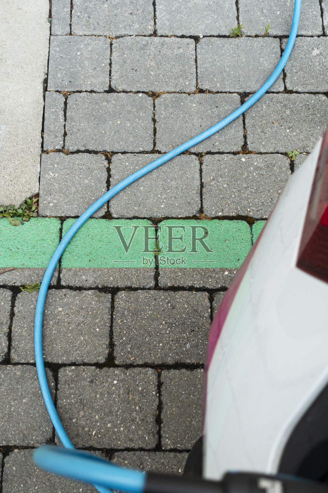 电动汽车充电站及电缆装置照片摄影图片