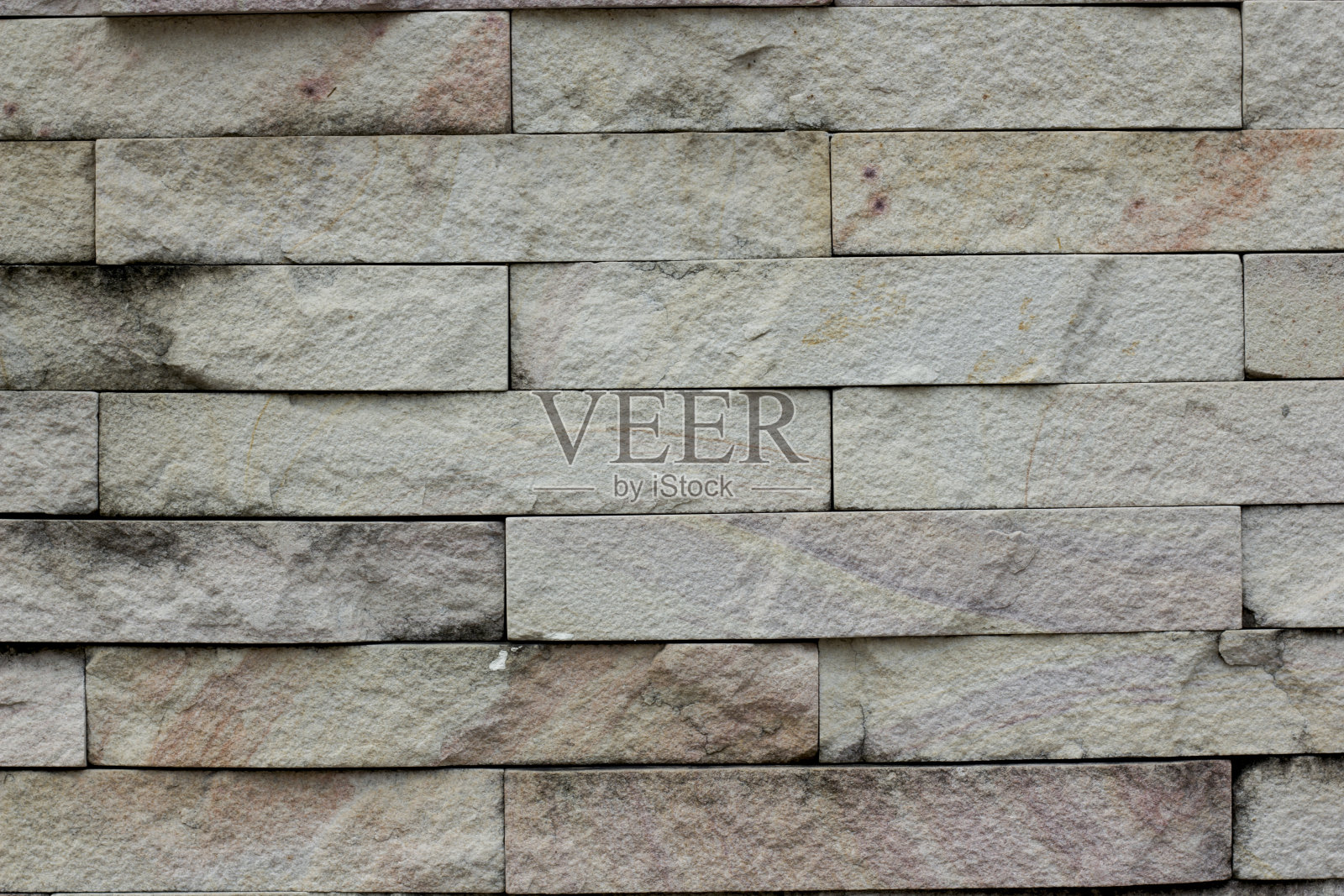 花岗石墙面有旧渍。照片摄影图片