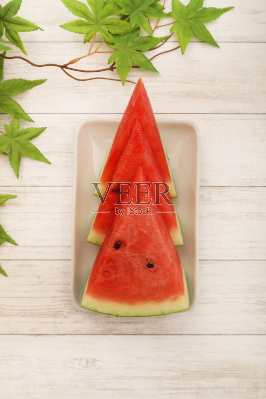 切西瓜照片摄影图片