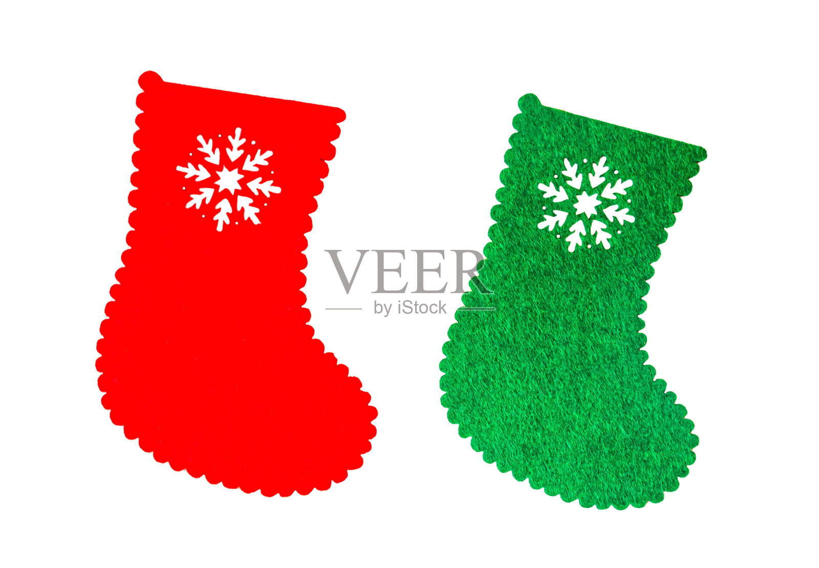 红色和白色手工圣诞袜孤立在一个白色的背景照片摄影图片