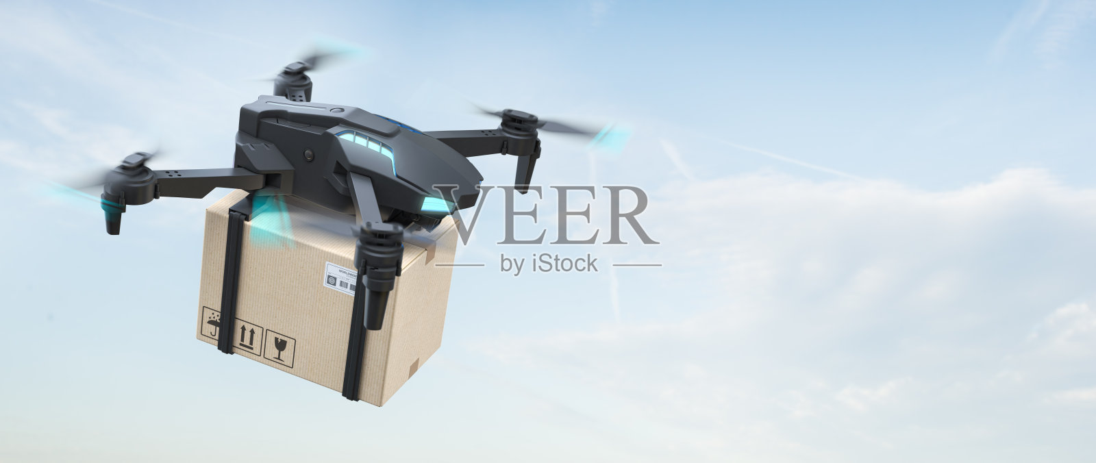 携带纸板箱的飞行送货无人机。快递理念。照片摄影图片