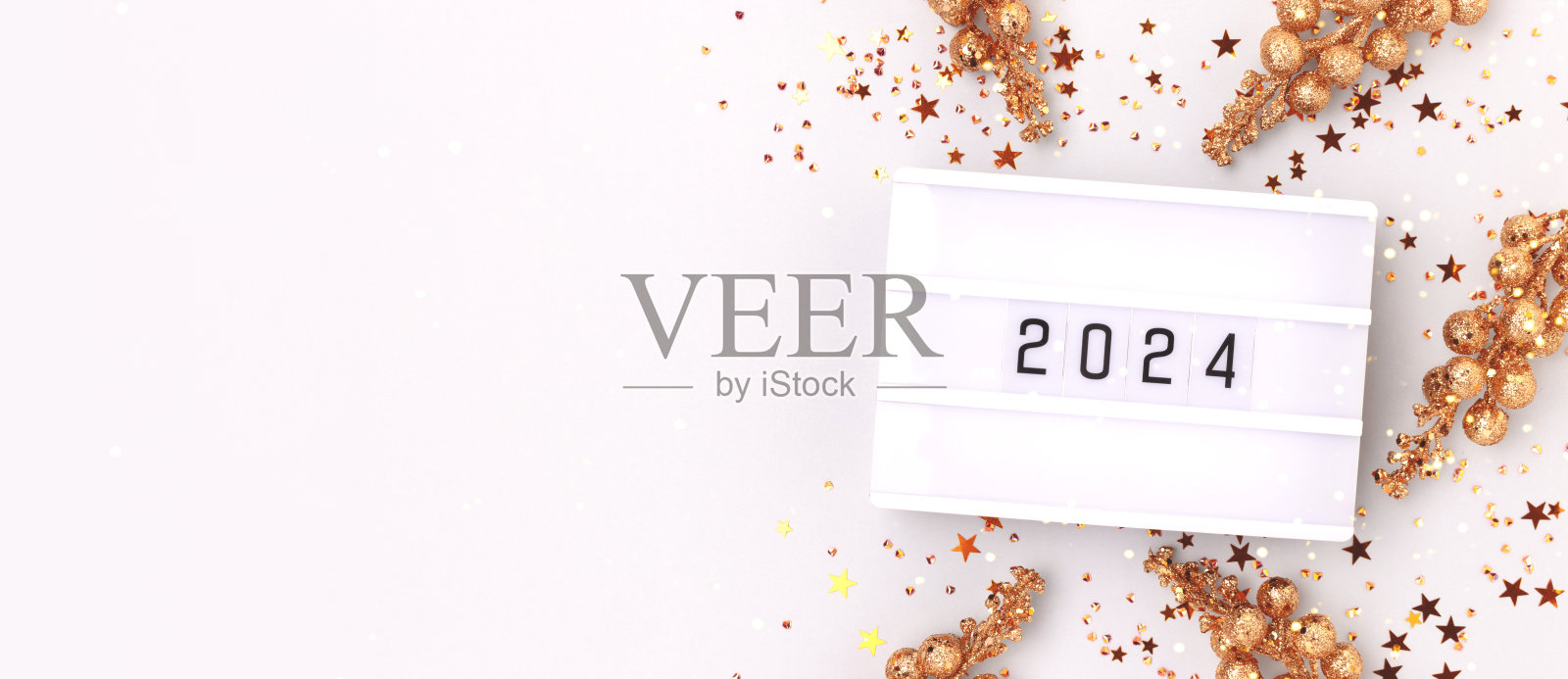 横幅上有2024年的数字,金色闪亮的星星,五彩纸屑和发光的树枝。照片摄影图片