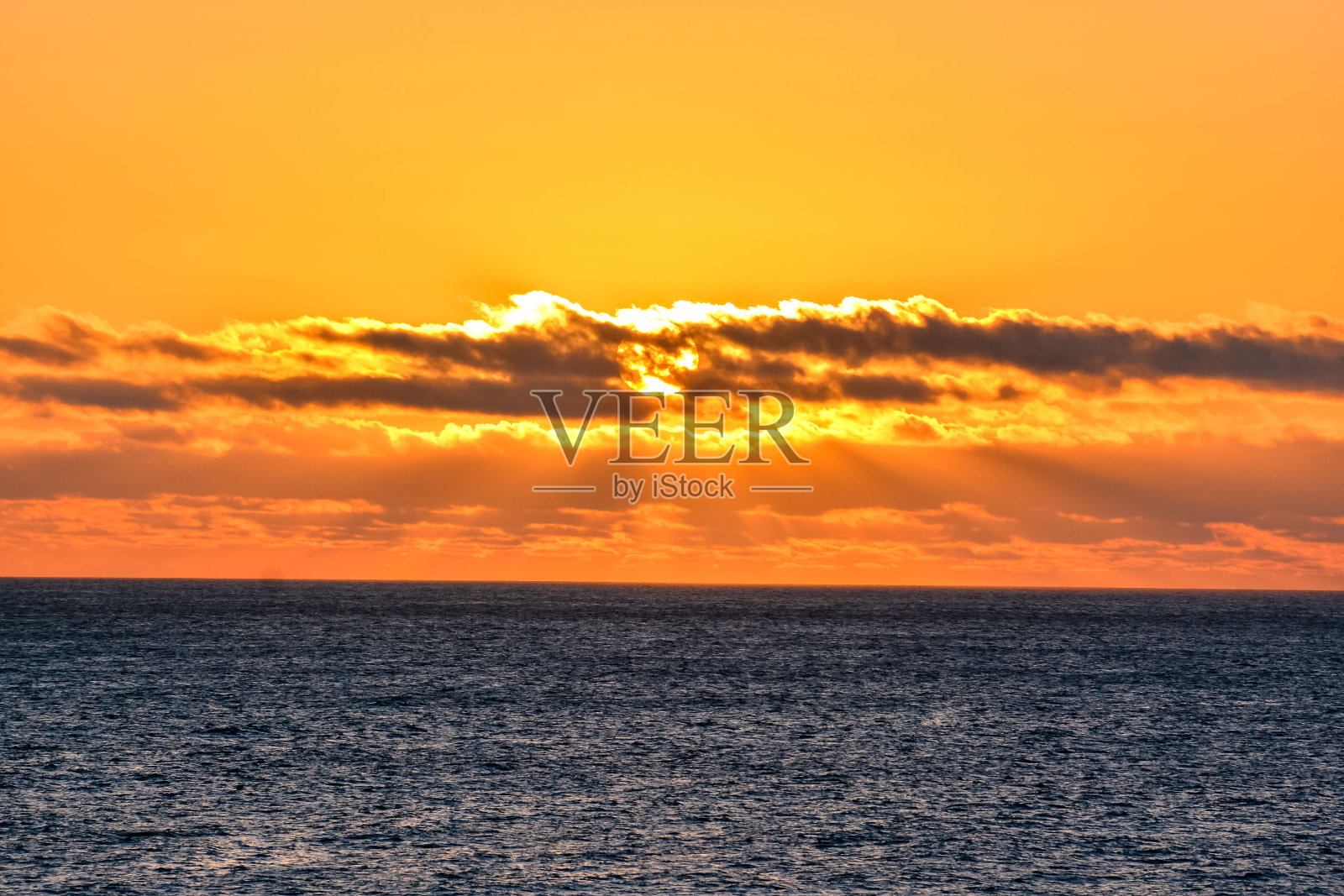 海上热带日落照片摄影图片