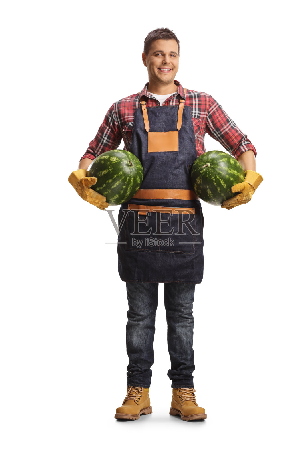 农夫腋下夹着两个西瓜照片摄影图片