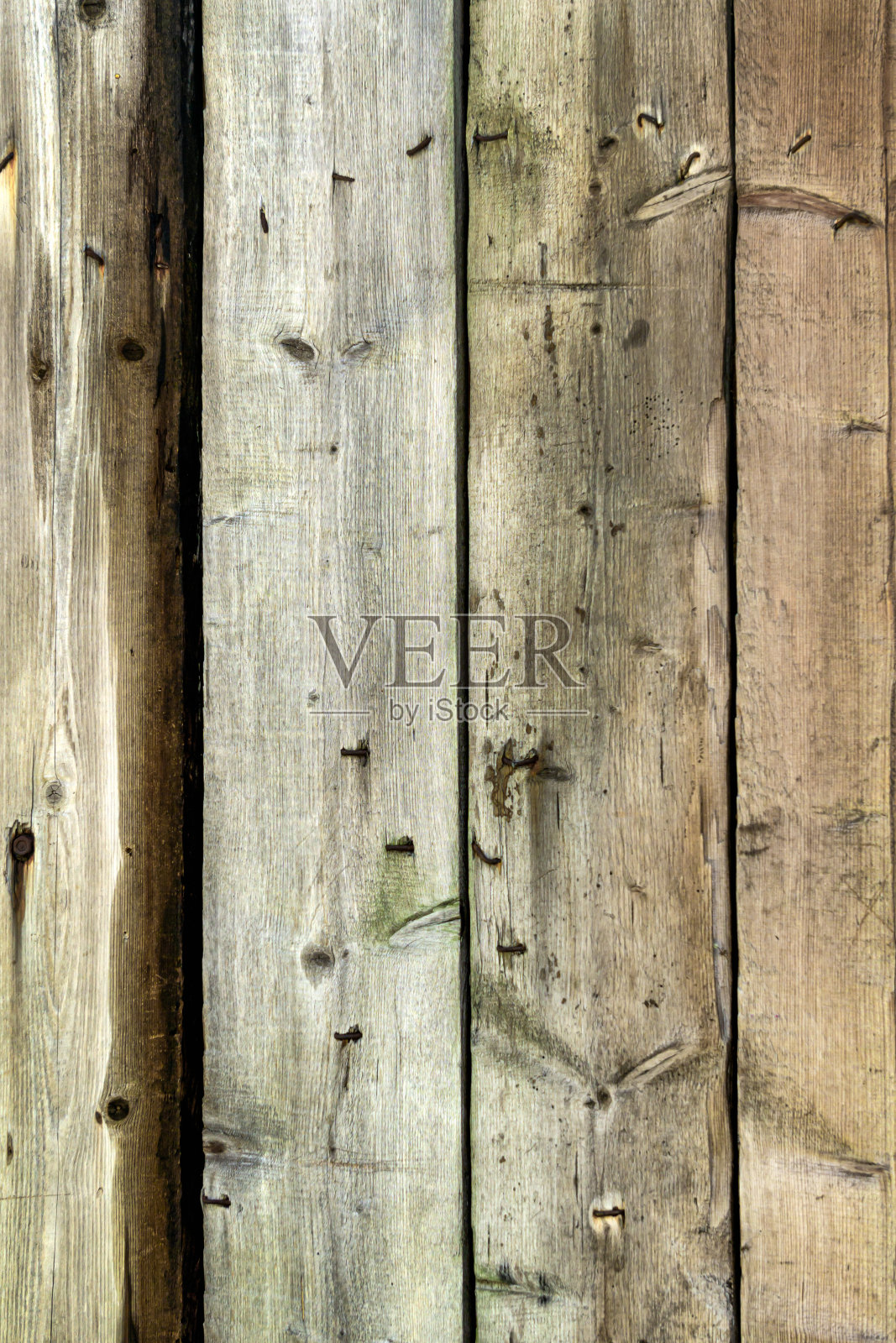 木结构建筑上的旧木板碎片。照片摄影图片