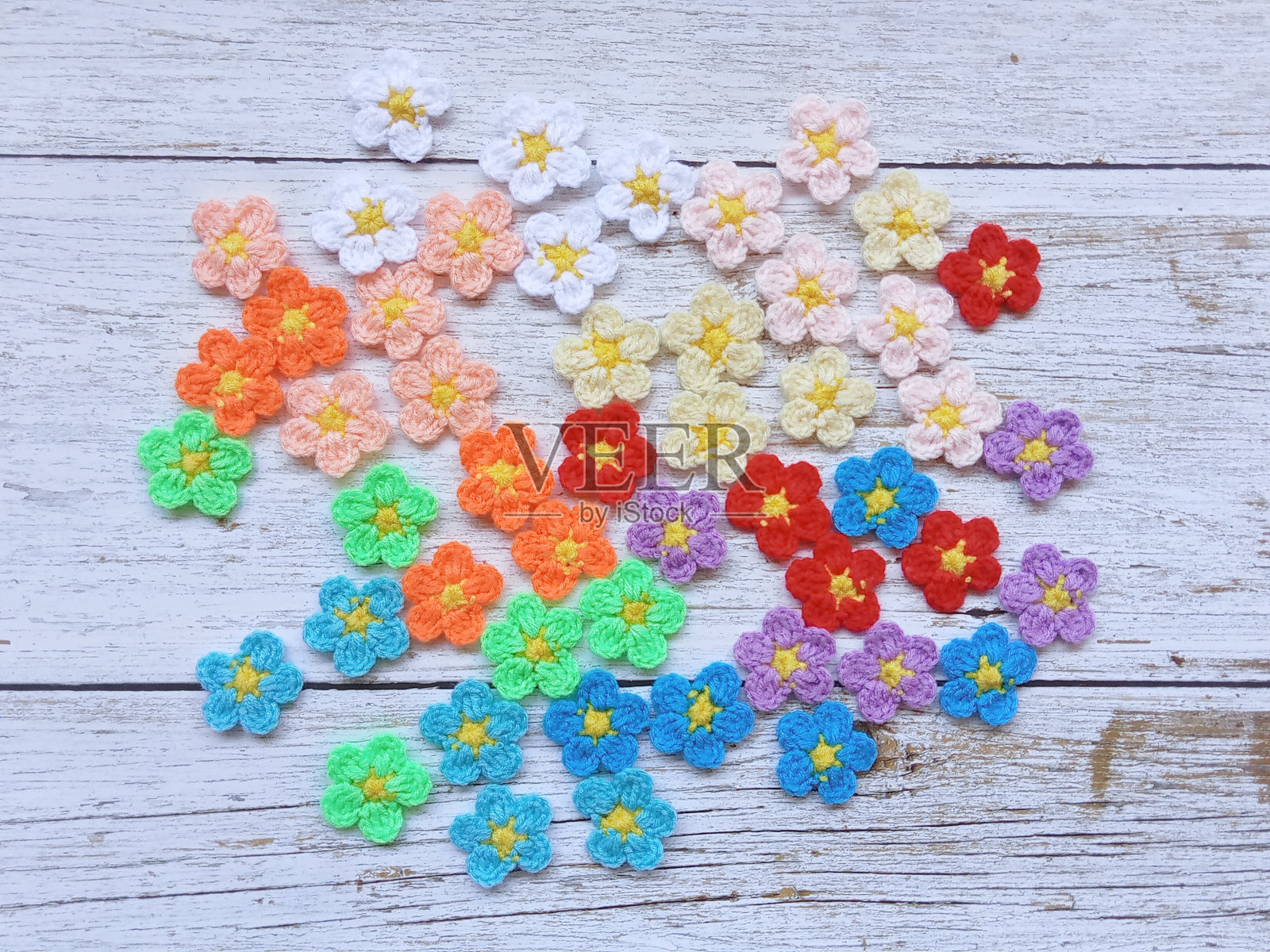 钩针迷你花多色手工背景纹理照片摄影图片