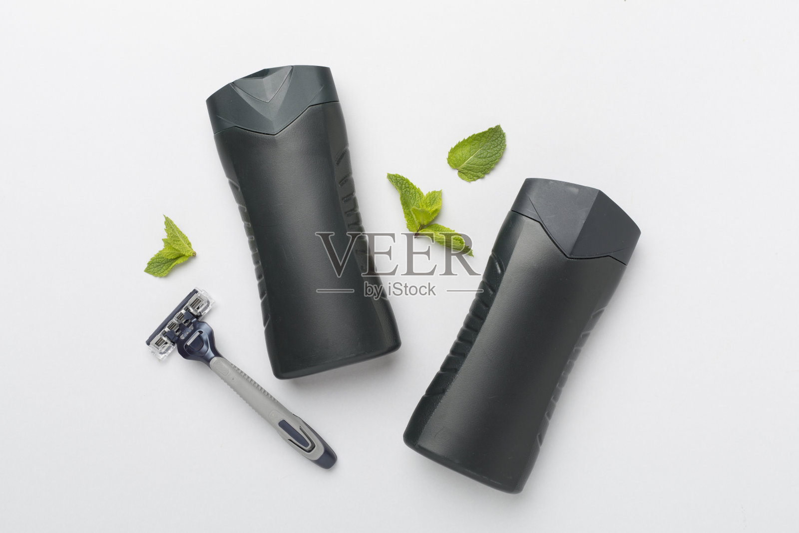 一套男士剃须工具的颜色背景,顶视图照片摄影图片