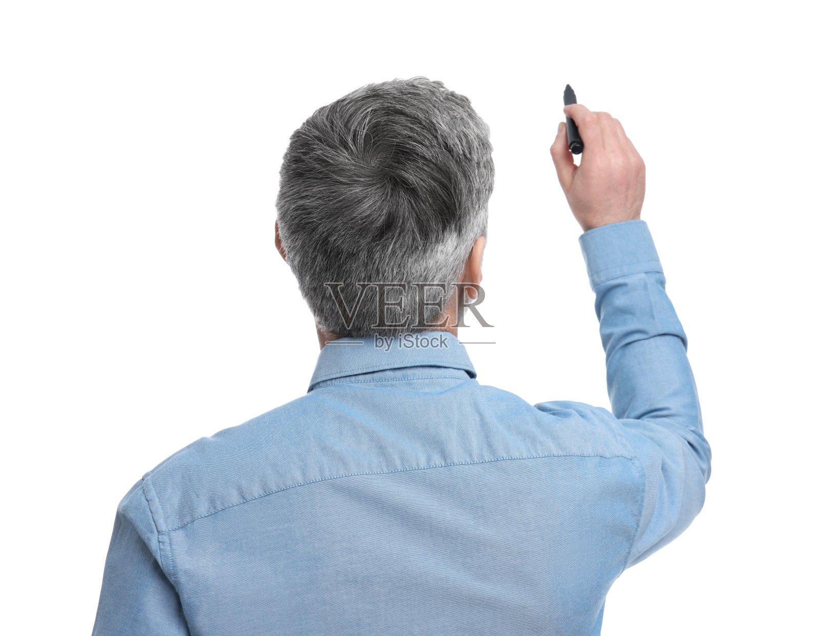成熟的商人,白色背景上的记号笔,后视图照片摄影图片