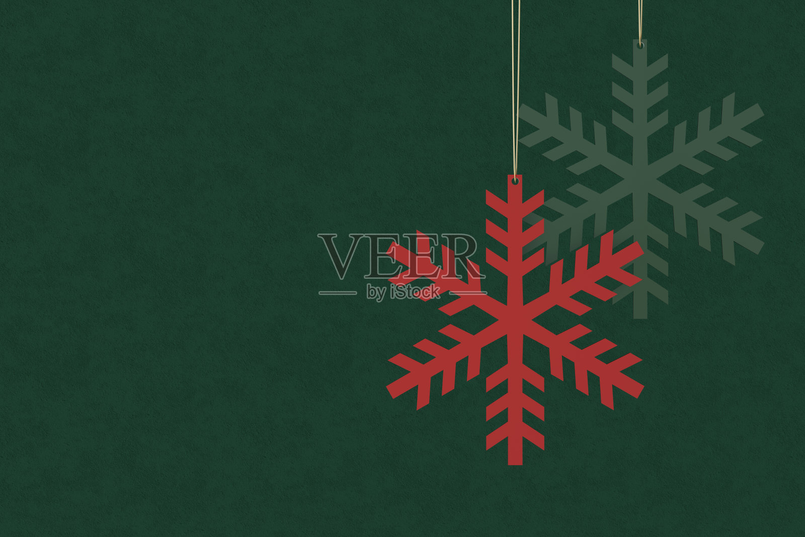 圣诞背景用雪花形状在绿色背景上,新年的概念。照片摄影图片