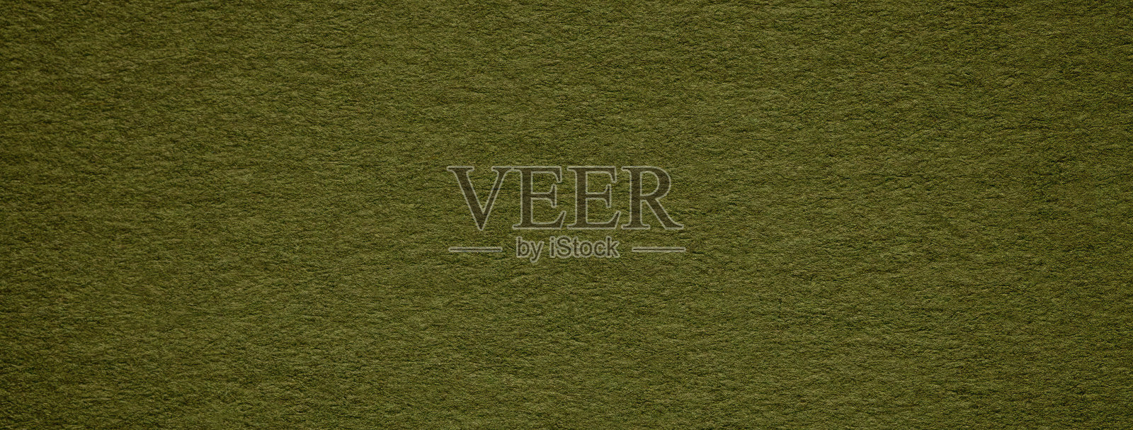 纹理深绿色和橄榄色纸的背景,宏观。致密卡其工艺纸板的结构。照片摄影图片