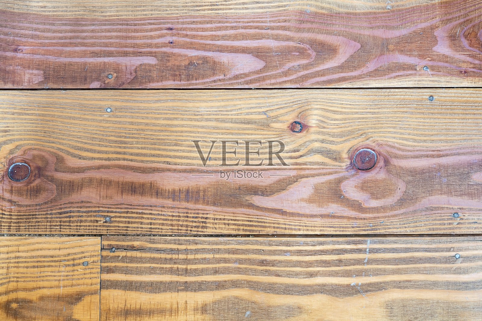 棕色和红色的乡村木材作为理想的背景,纹理和抽象的设计形象。照片摄影图片