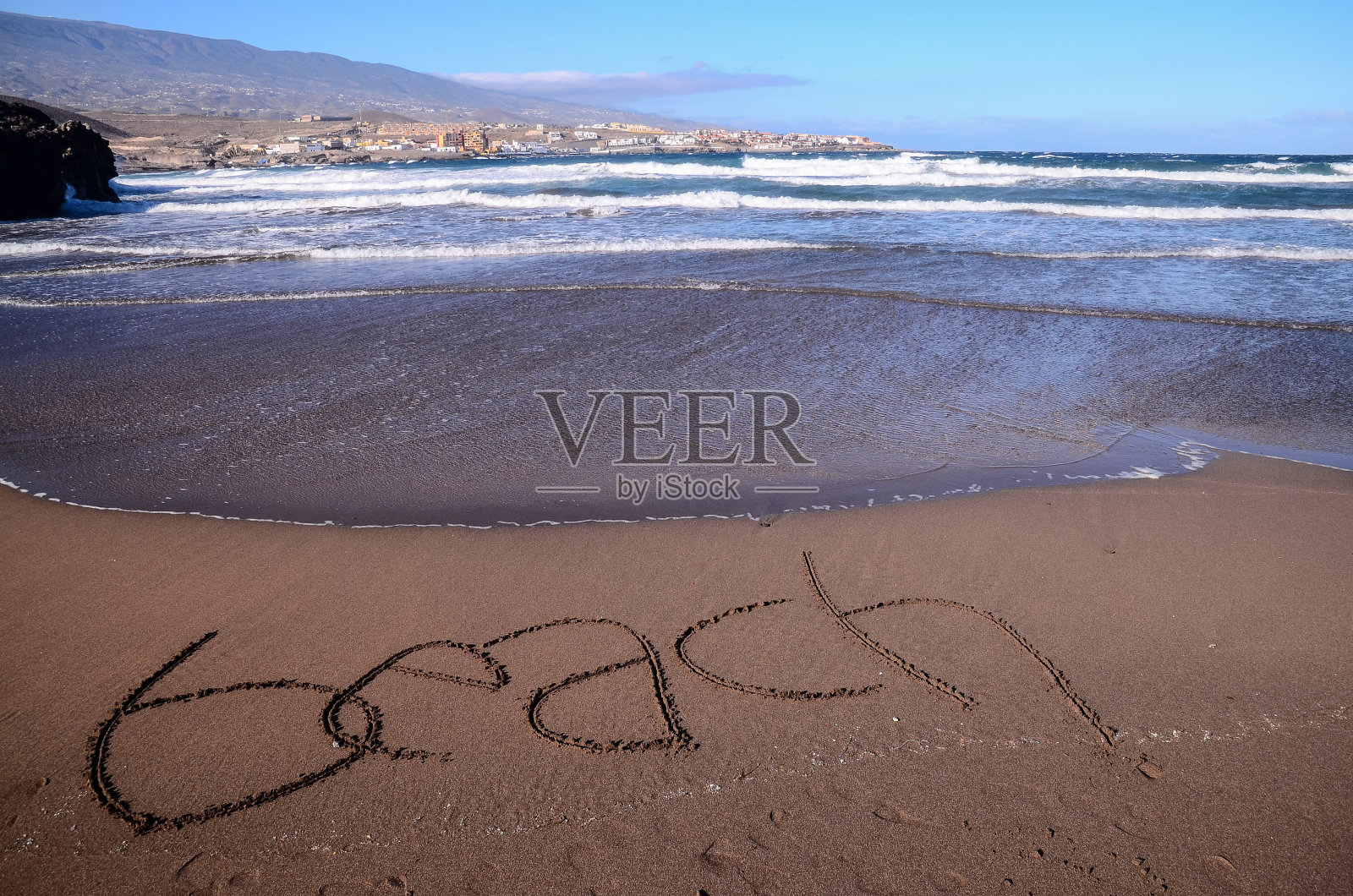 写在沙滩上的字照片摄影图片