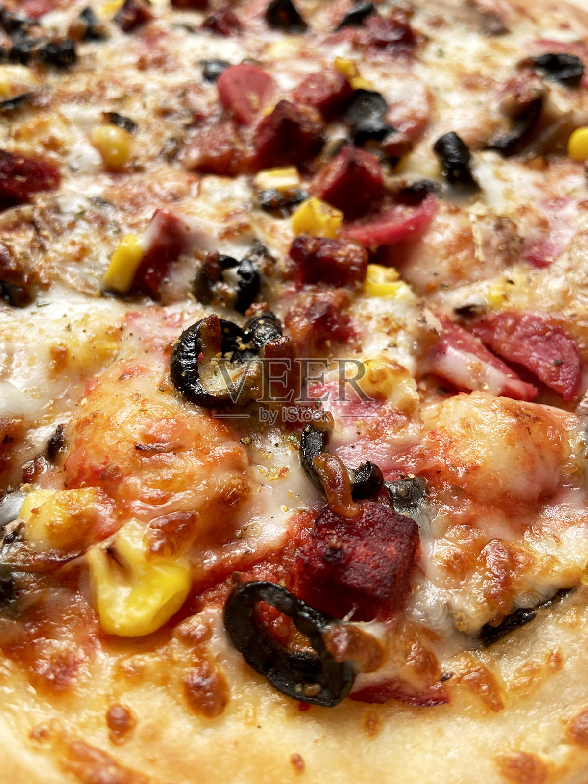 披萨背景,特写混合披萨照片摄影图片