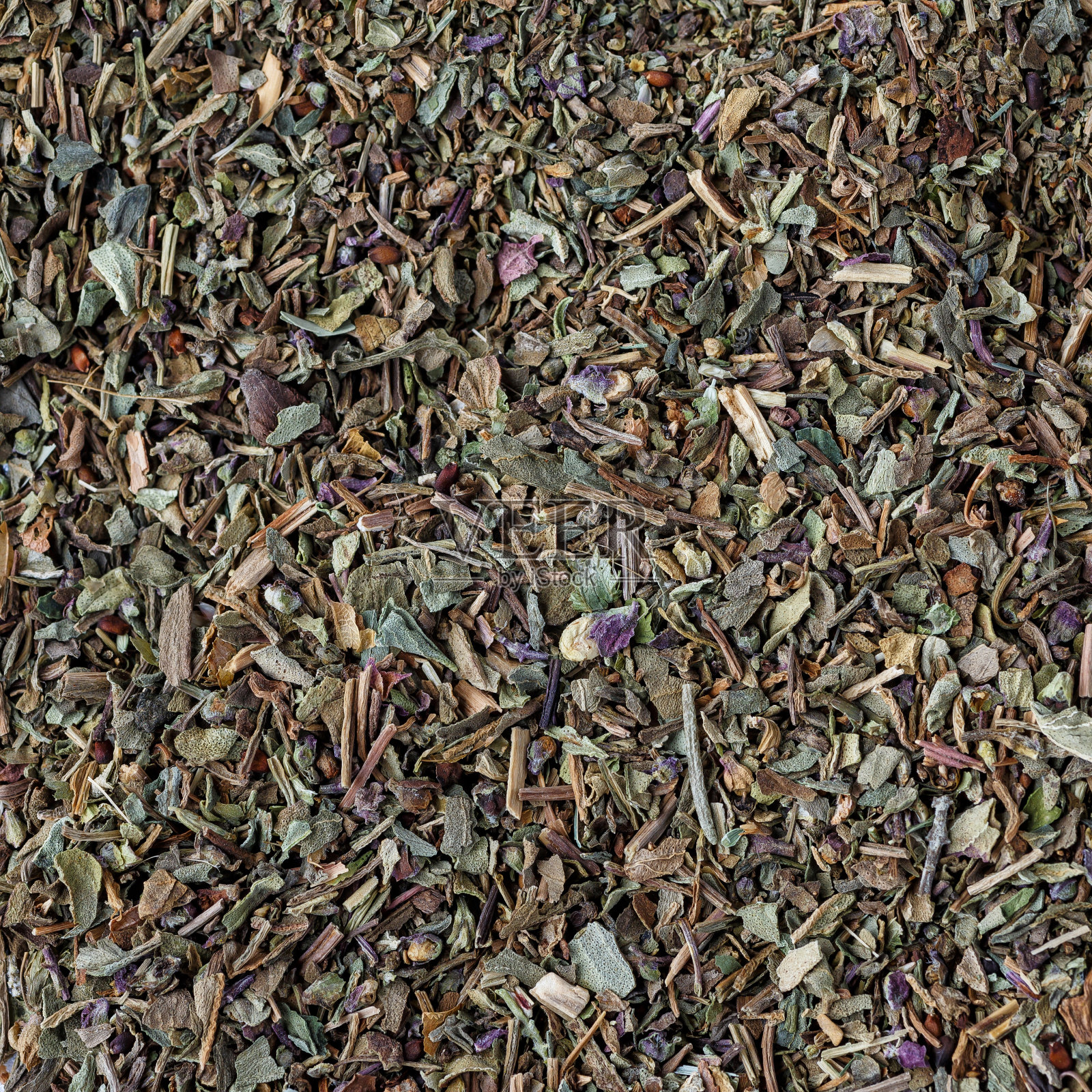 背景由中东传统香料制成。前视图。近距离观察不同香料的混合物。丰富多彩的香料和调味品的质感。照片摄影图片