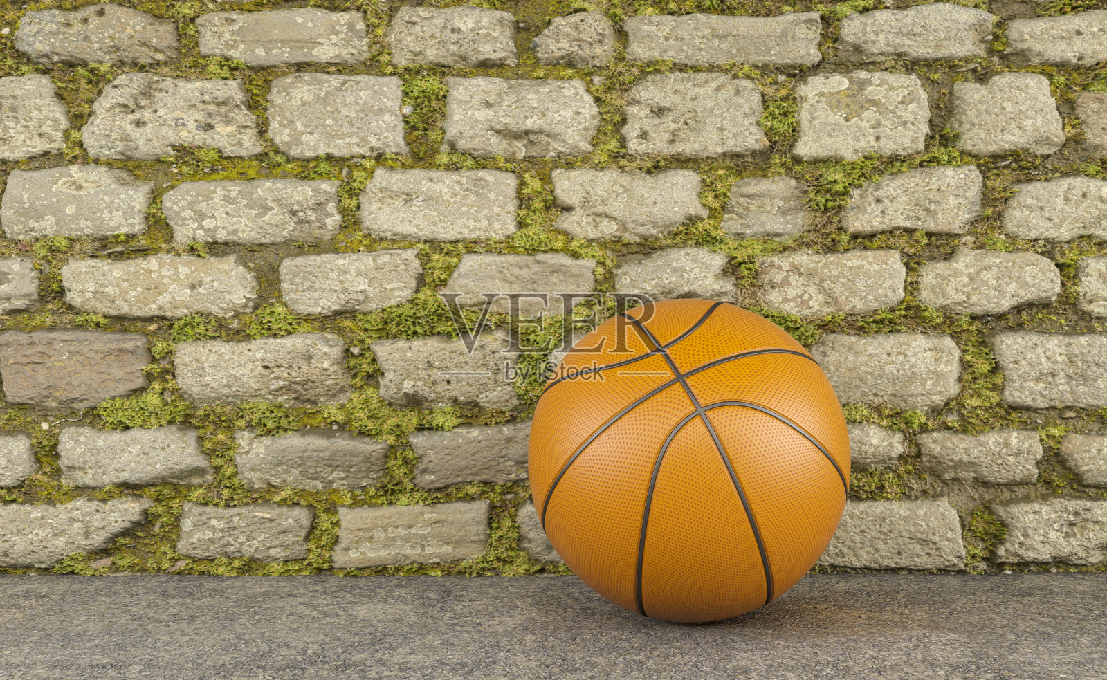 站在石墙前的篮球照片摄影图片