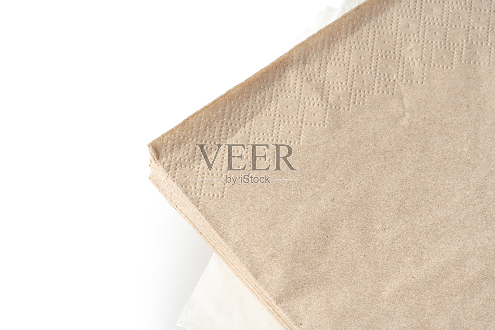 白色背景上的一叠纸巾照片摄影图片