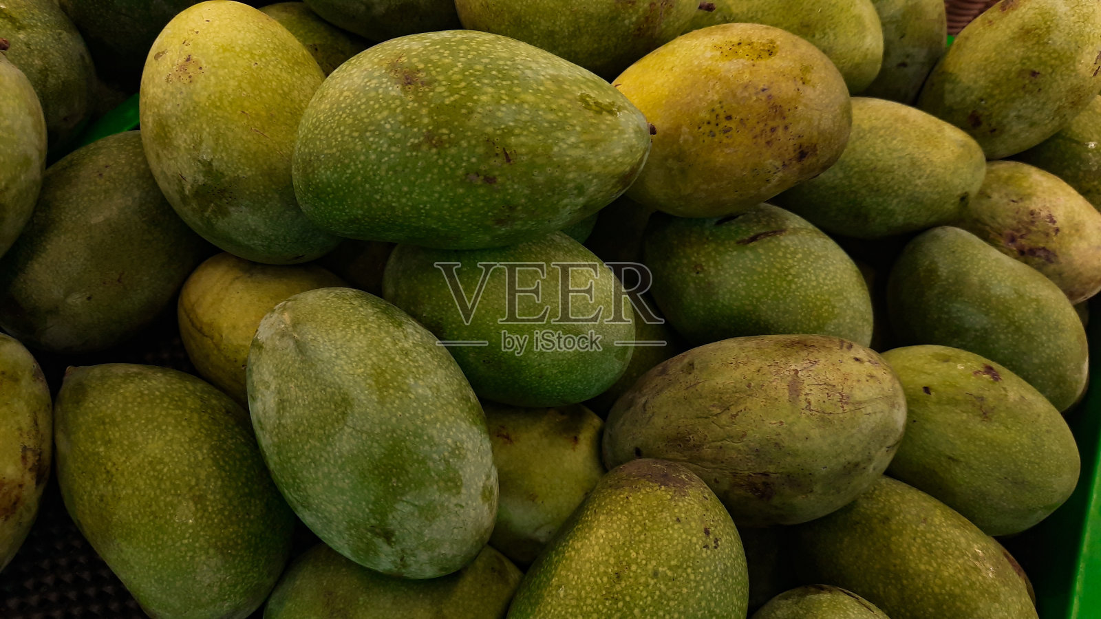 芒果是一种热带水果照片摄影图片