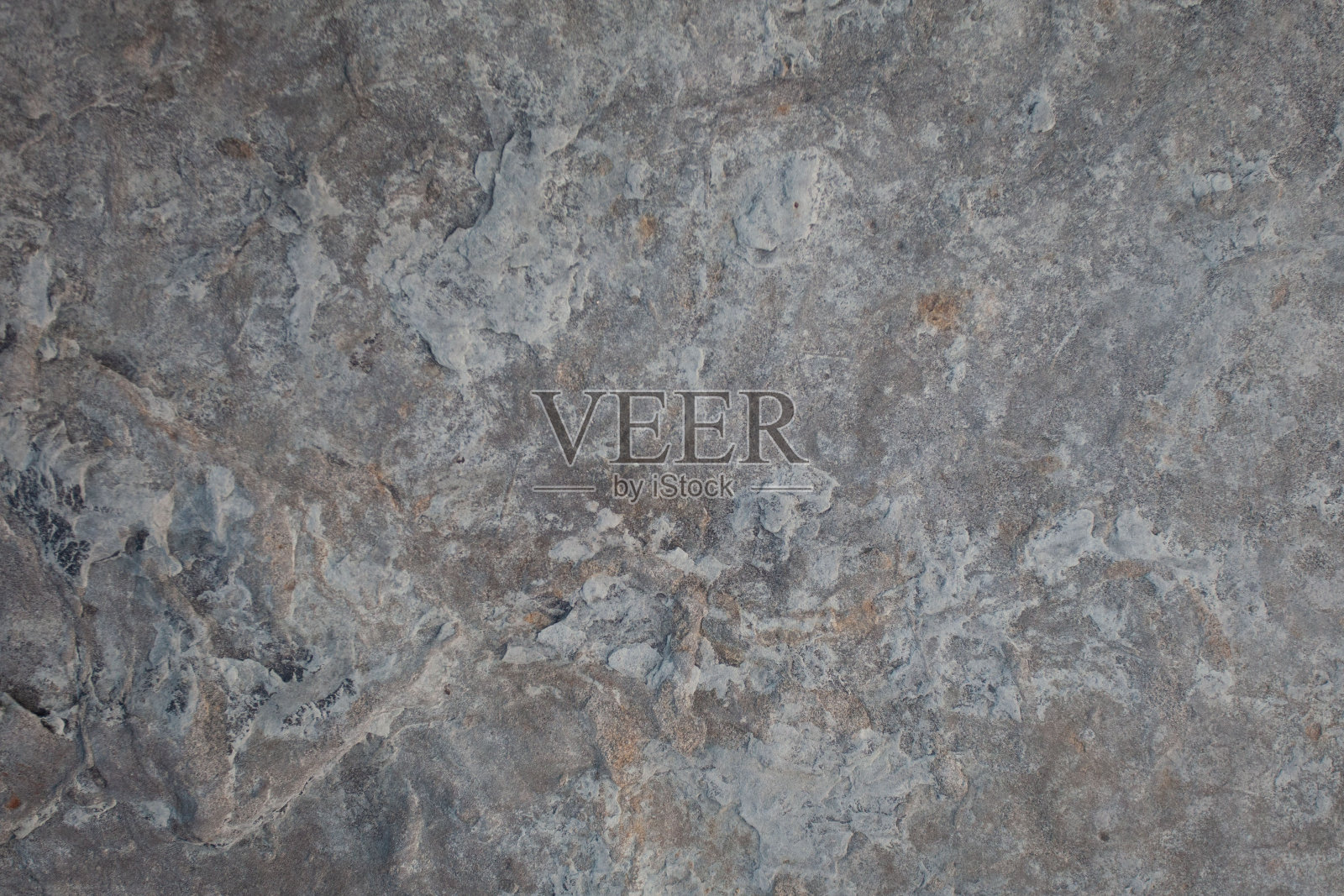 抽象的灰色和棕色纹理,粗糙的岩石背景与裂缝照片摄影图片