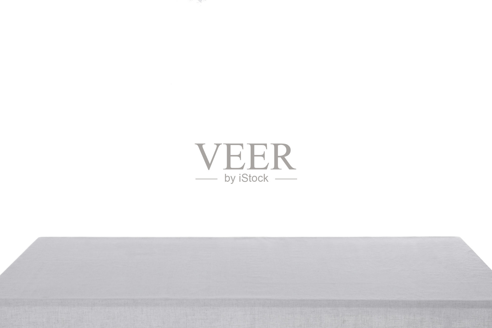 餐桌用白色桌布隔在白色上照片摄影图片