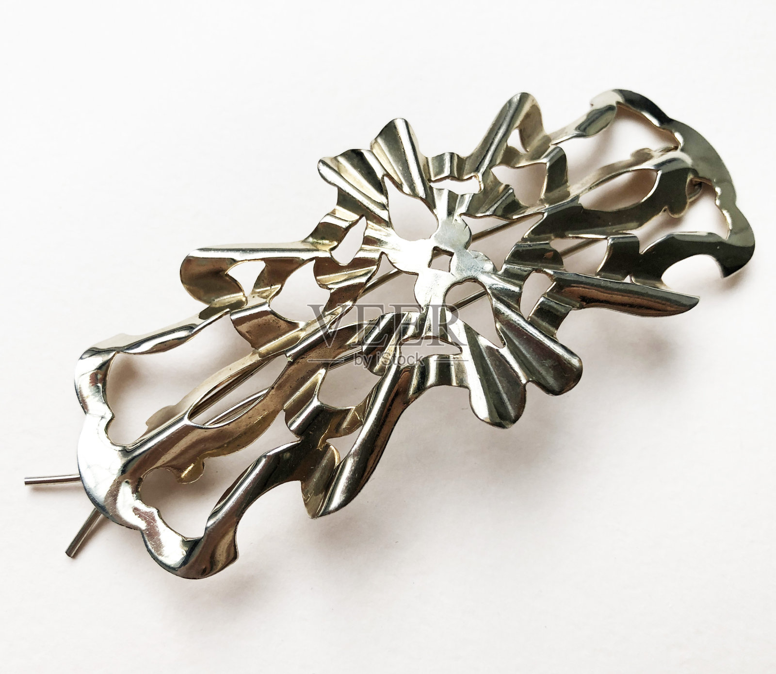 不寻常的复古发夹在白色,花式金色发饰照片摄影图片