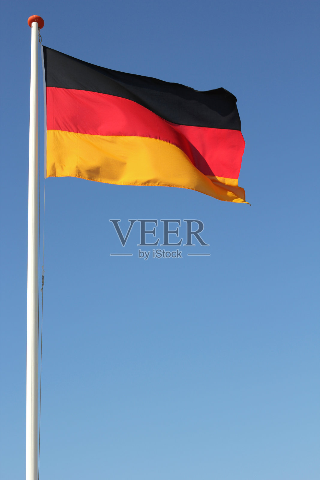 德国国旗在风中飘扬照片摄影图片