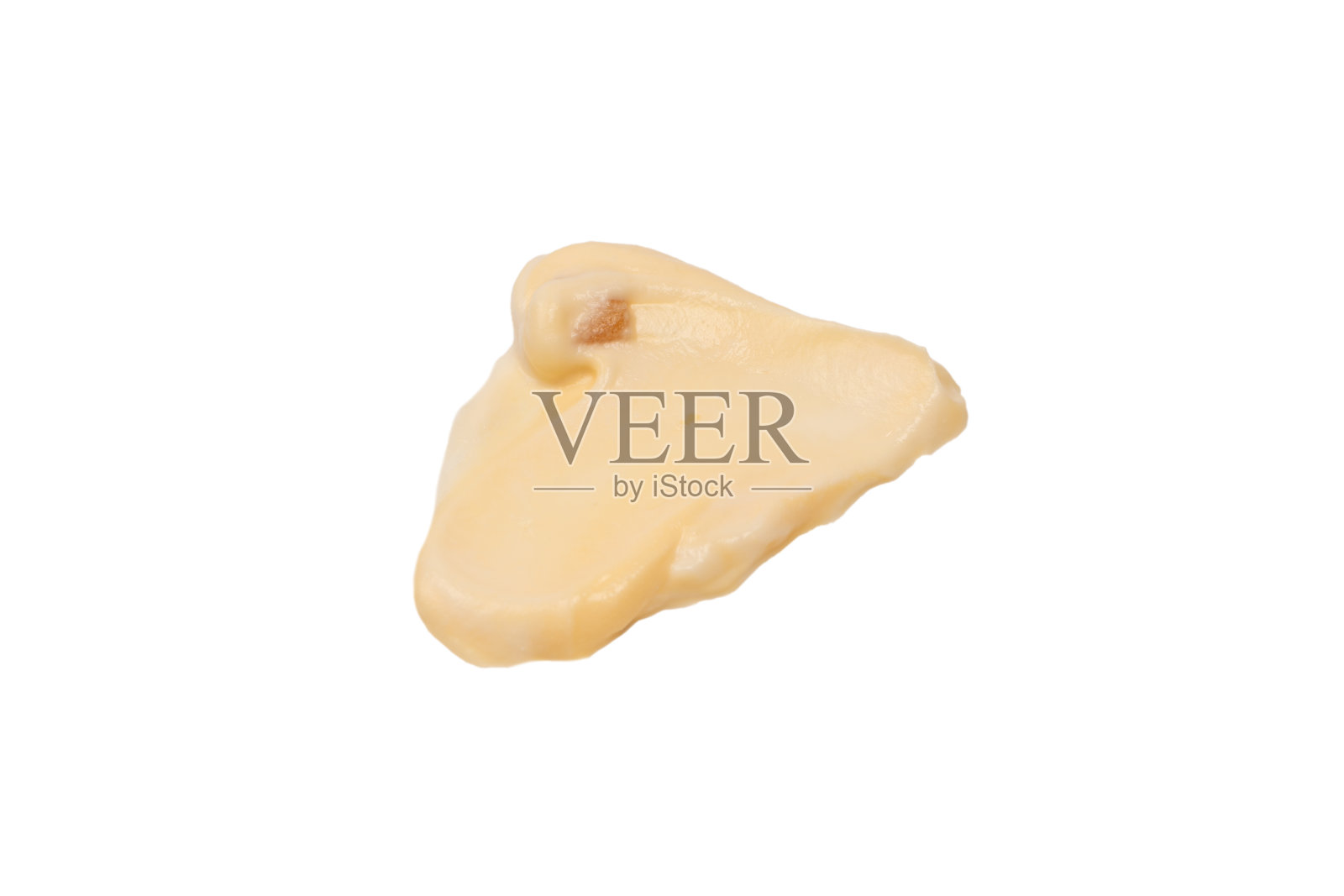 白色的酱汁溅在白色的背景上。照片摄影图片