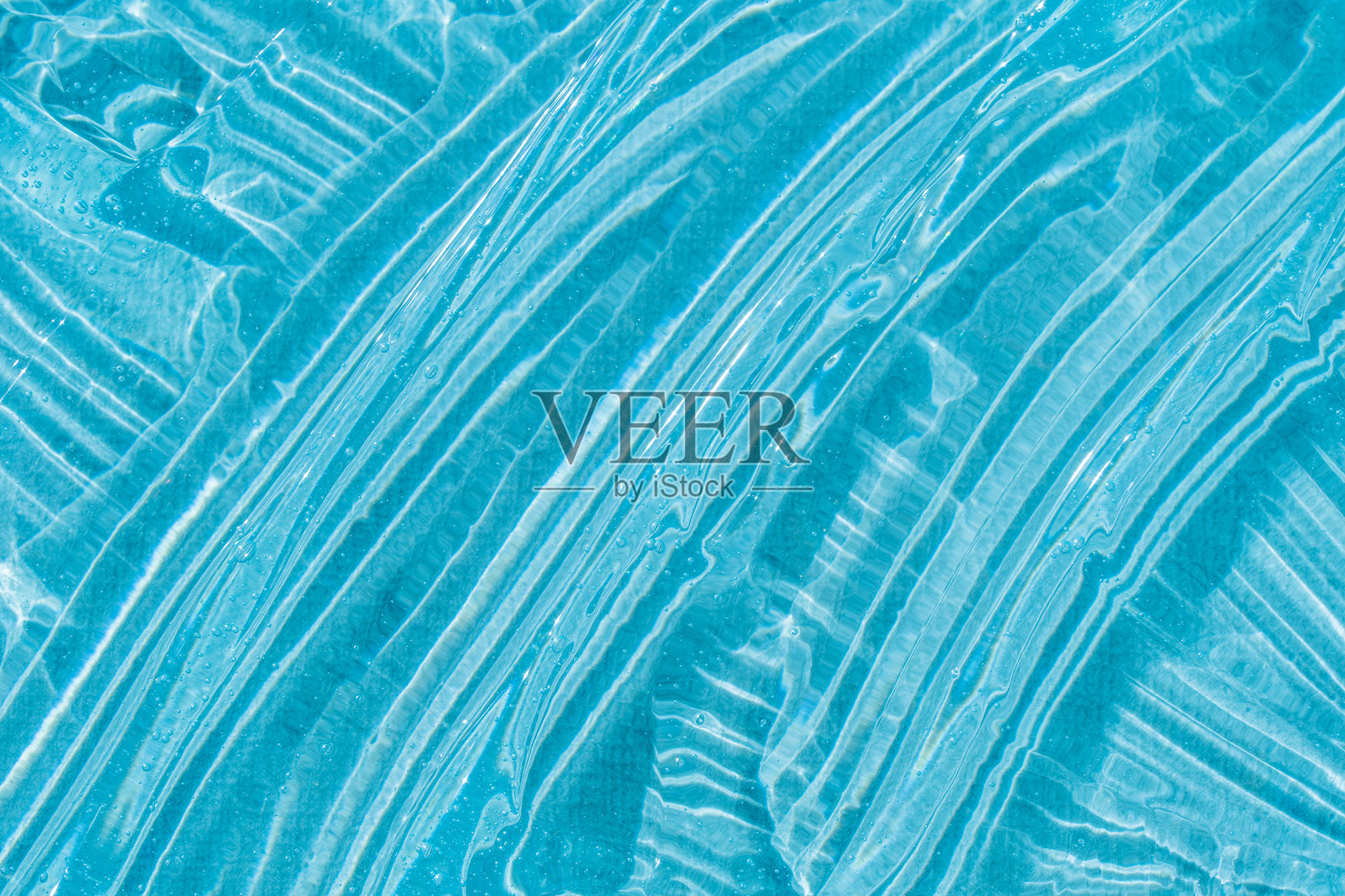 护肤乳液面部产品样品。透明质酸皮肤护理与胶原蛋白和视黄醇。精华纹理,透明凝胶,泡沫背景。护肤美容爽肤水。照片摄影图片