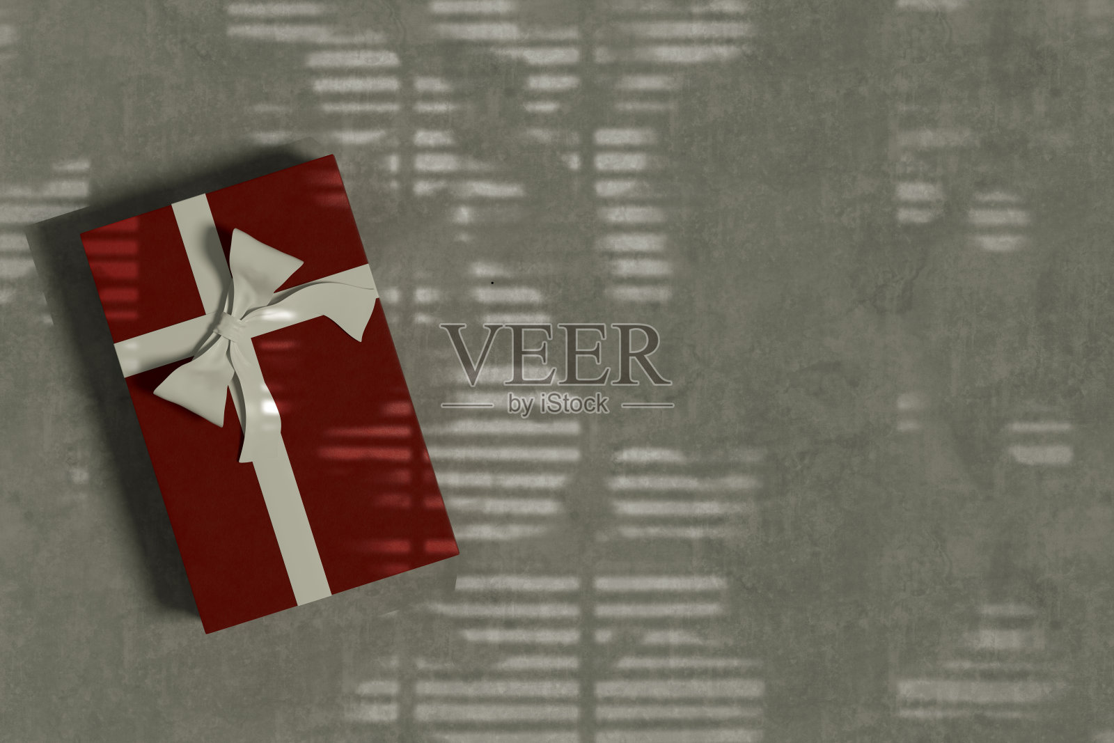 礼盒顶部视图在灰色背景与光束照片摄影图片