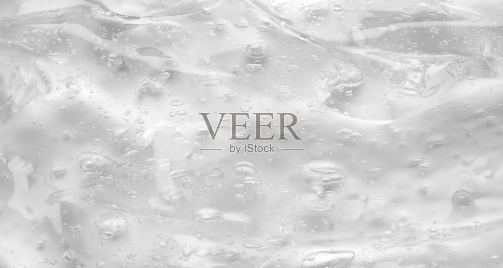 透明透明的液体精华液凝胶化妆品纹理背景照片摄影图片