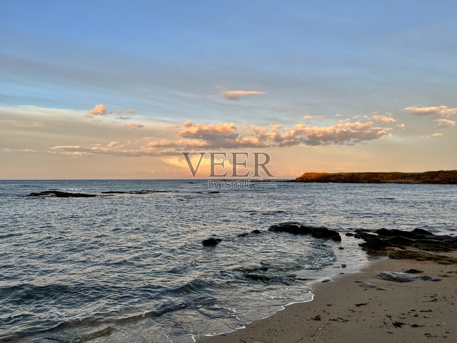 比德内尔湾海滩的日落照片摄影图片