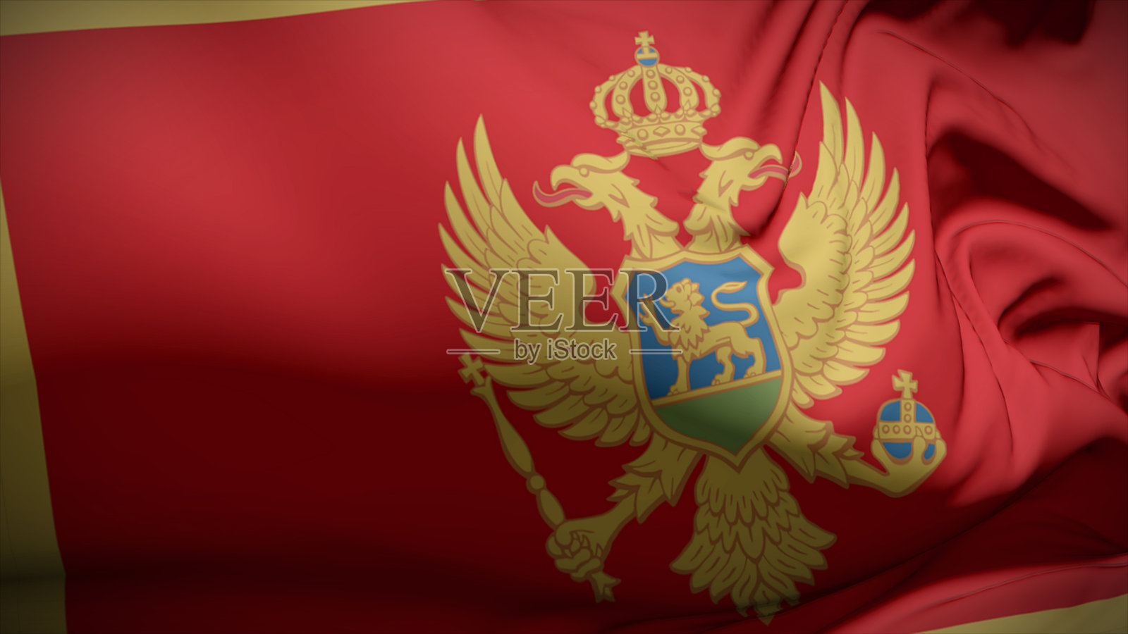 黑山国旗在风中飘扬的特写镜头。照片摄影图片