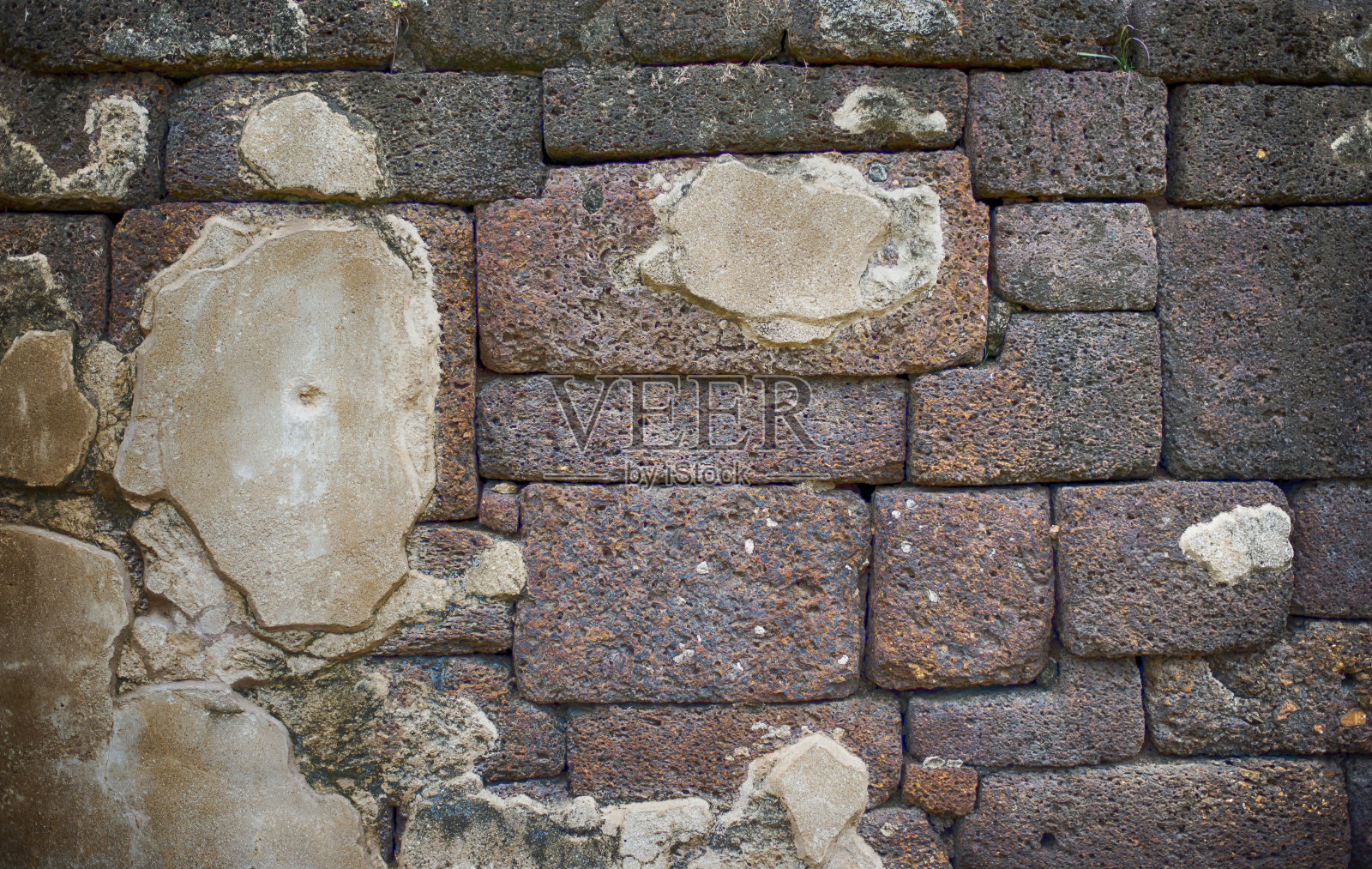 背景图像的表面是破旧的砖墙。照片摄影图片