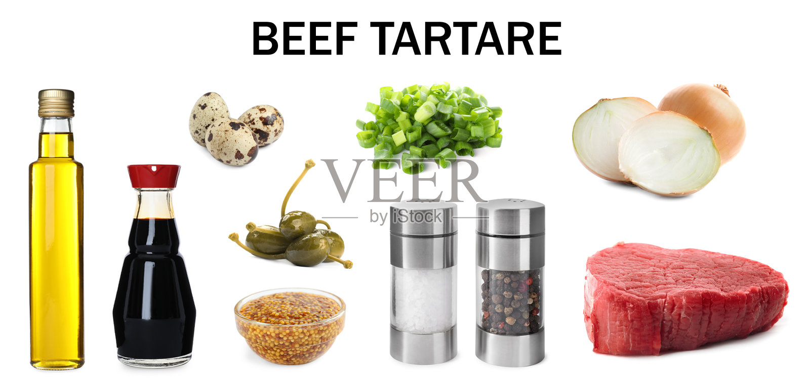 在白色的背景上搭配不同的新鲜食材制作美味的鞑靼牛肉照片摄影图片