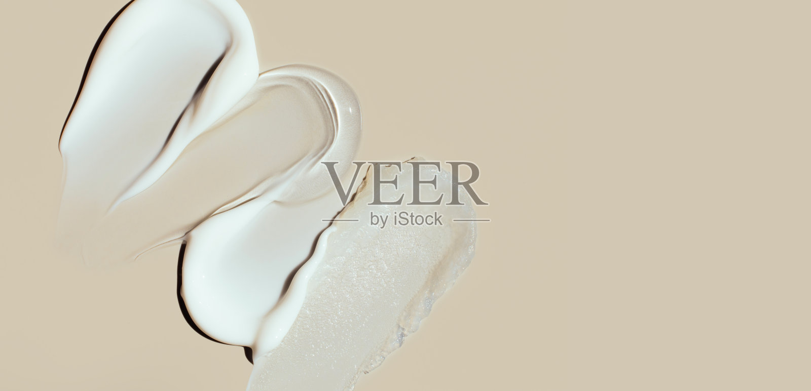 米色背景上的奶油质感化妆品涂抹照片摄影图片