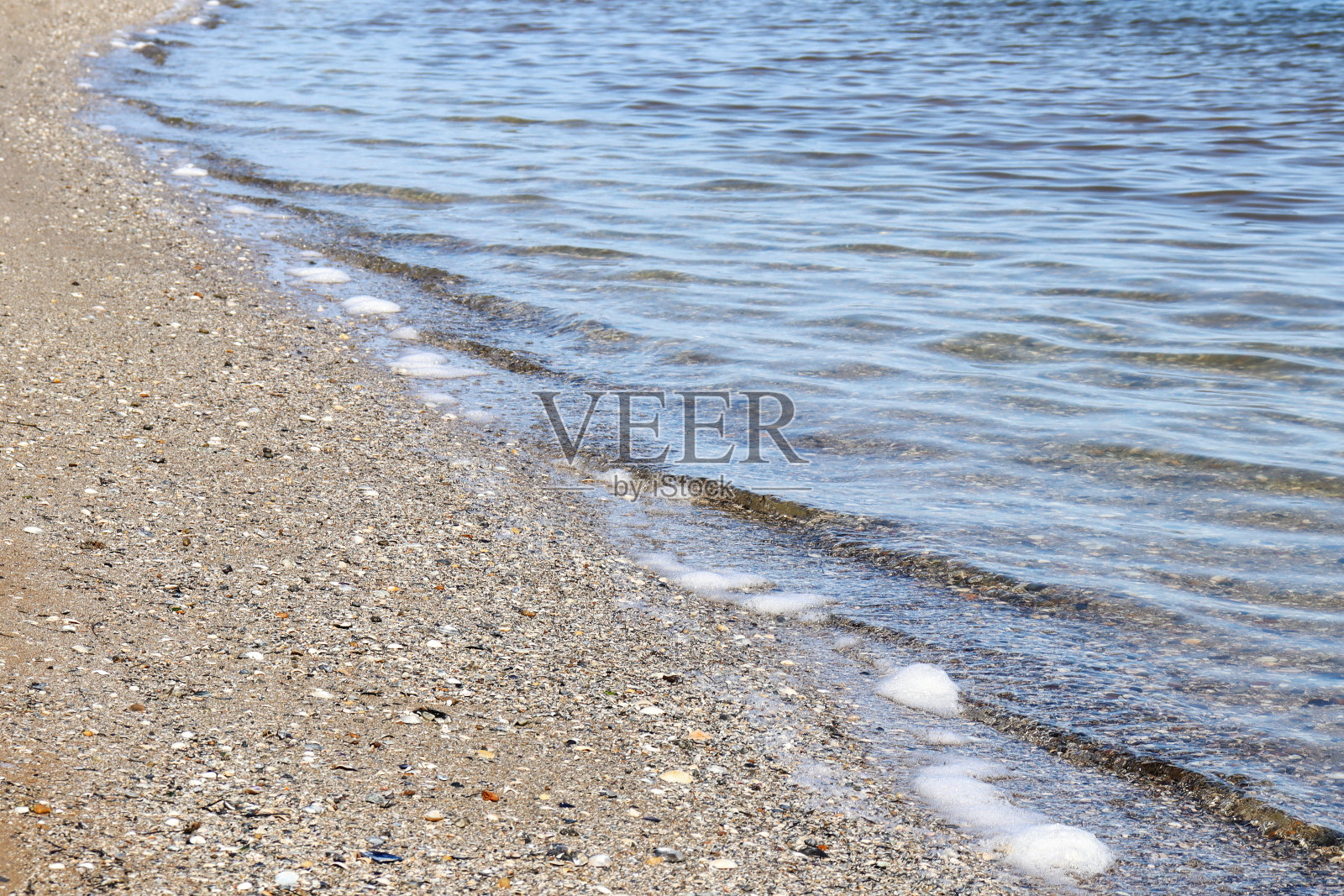 海滩上的波浪照片摄影图片