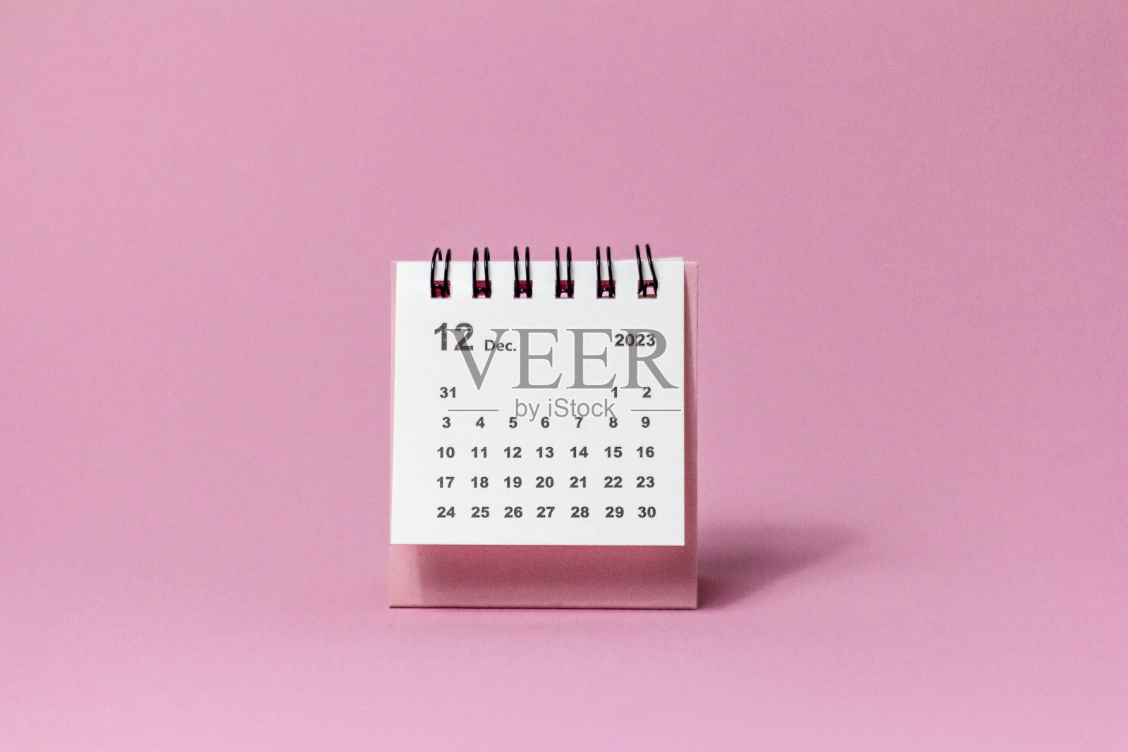 你好,12月。2023年12月的台历。计划每月的日历。照片摄影图片