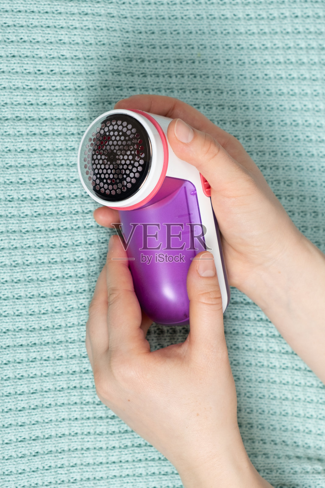 采购产品电动便携式衣服药丸去除器,衣服护理设备。照片摄影图片