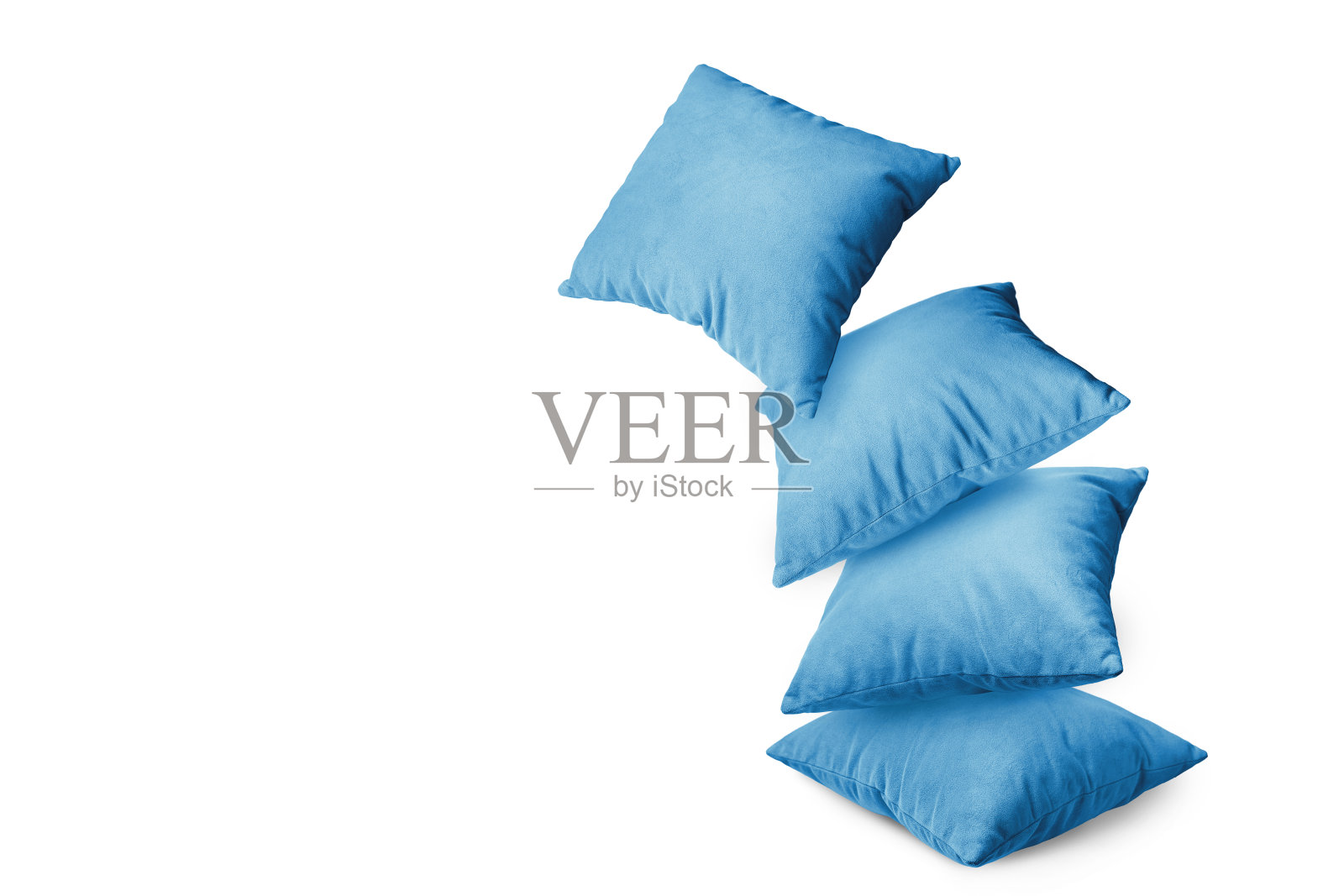 白色背景上的一堆蓝色枕头照片摄影图片