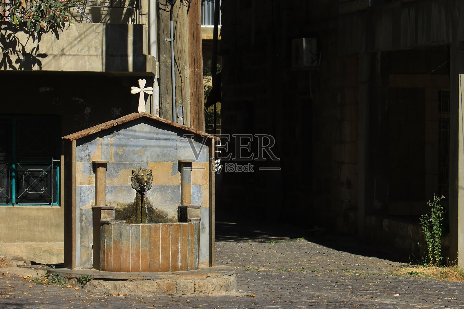 古老的村庄喷泉照片摄影图片