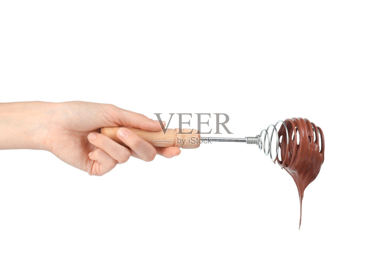 拿着巧克力奶油打蛋器的女人孤立在白色,特写照片摄影图片