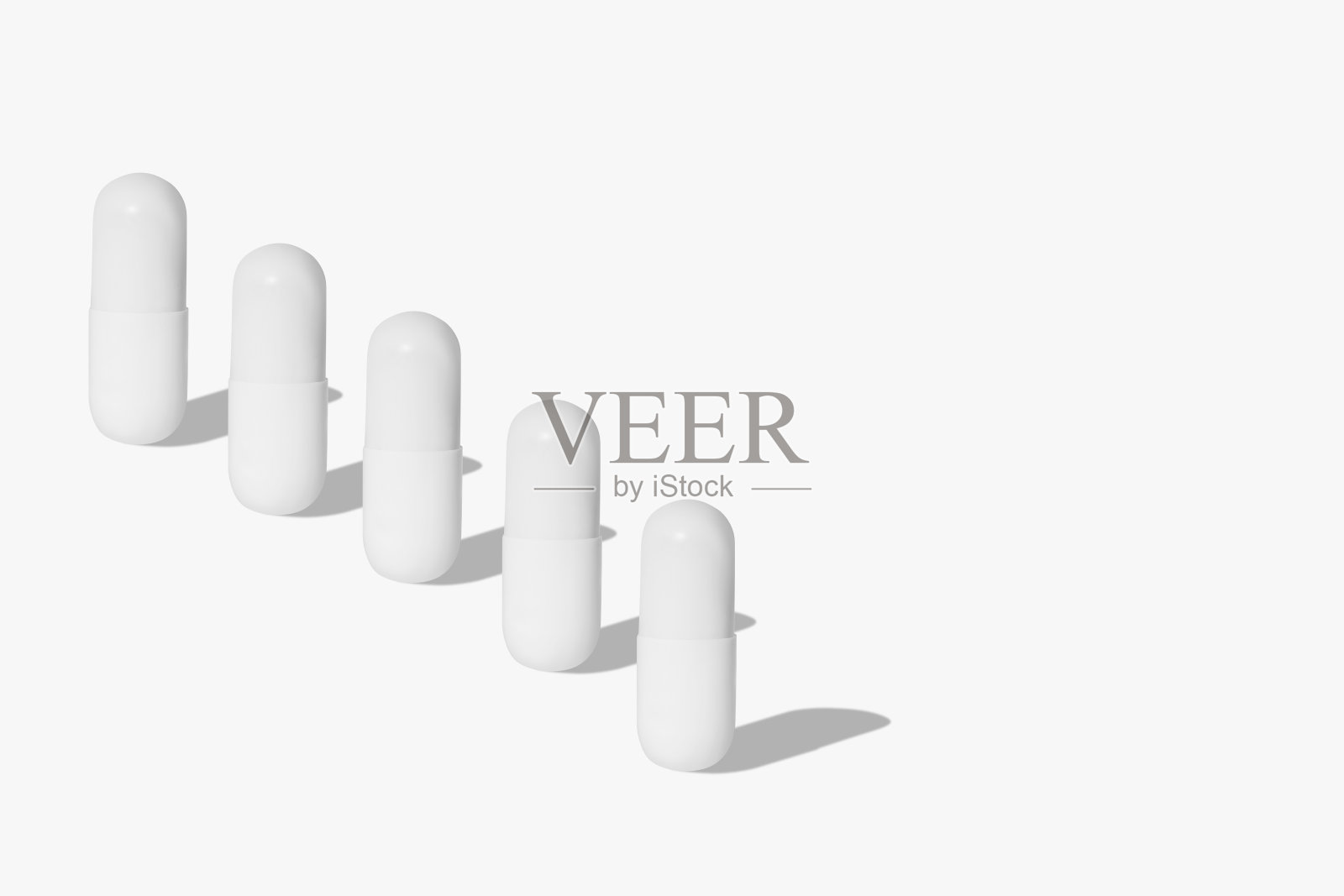 白色药片和药片。在浅色背景上。照片摄影图片