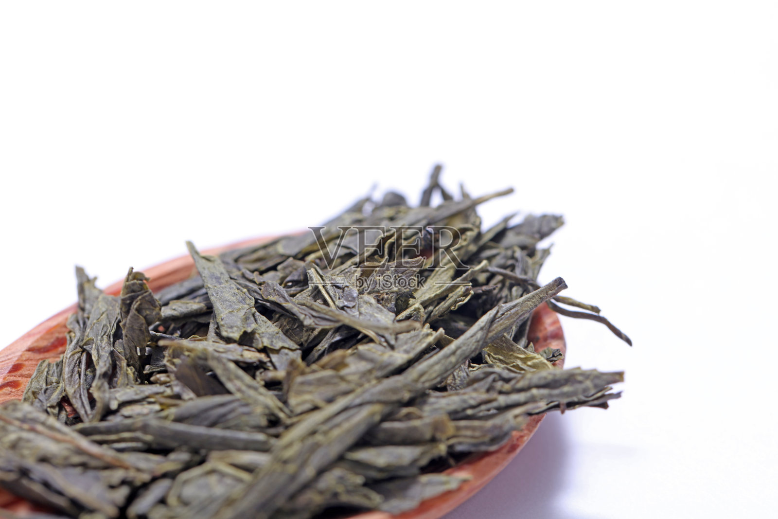 绿茶的干叶和卷叶照片摄影图片